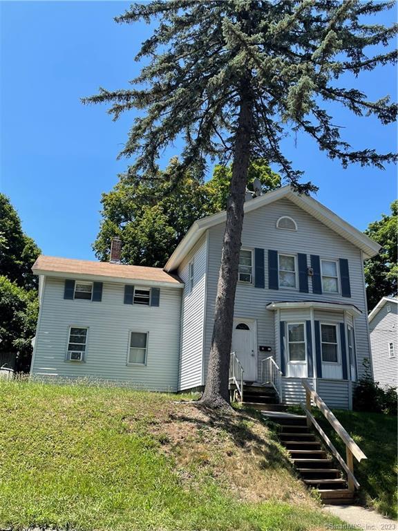 a front view of house with yard