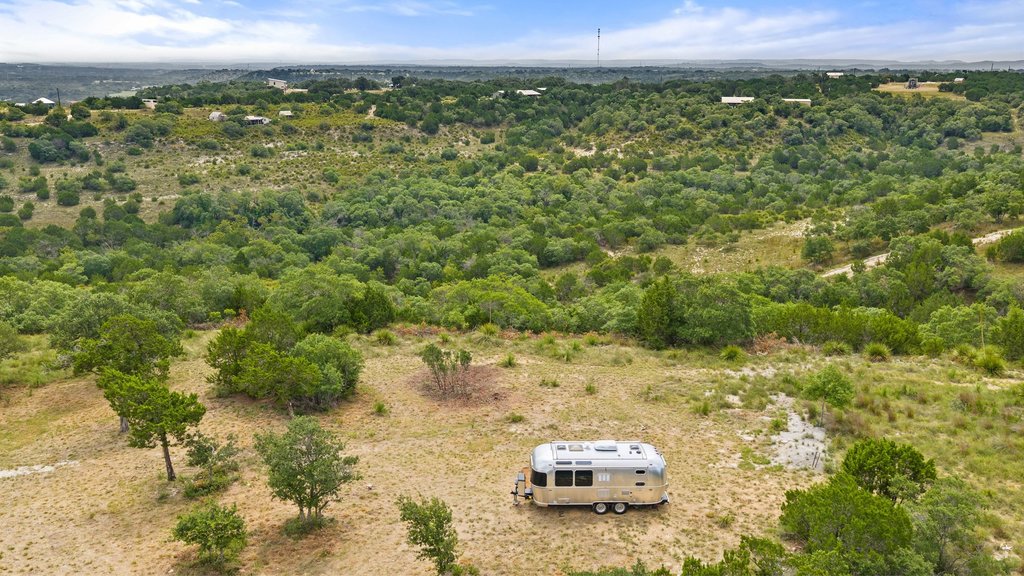 2126 Hidden Valley Ranch Road Johnson City, TX 78636 - Photo 6 of 36 Vast natural surroundings provide a peaceful setting with verdant trees and ample space for development.