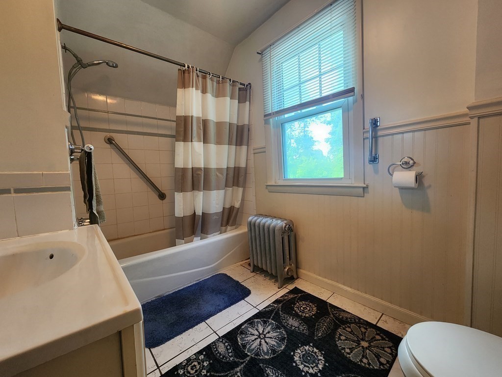 4 Sutton Place Worcester, MA 01603 - Photo 21 of 32 a bathroom with a sink toilet and shower