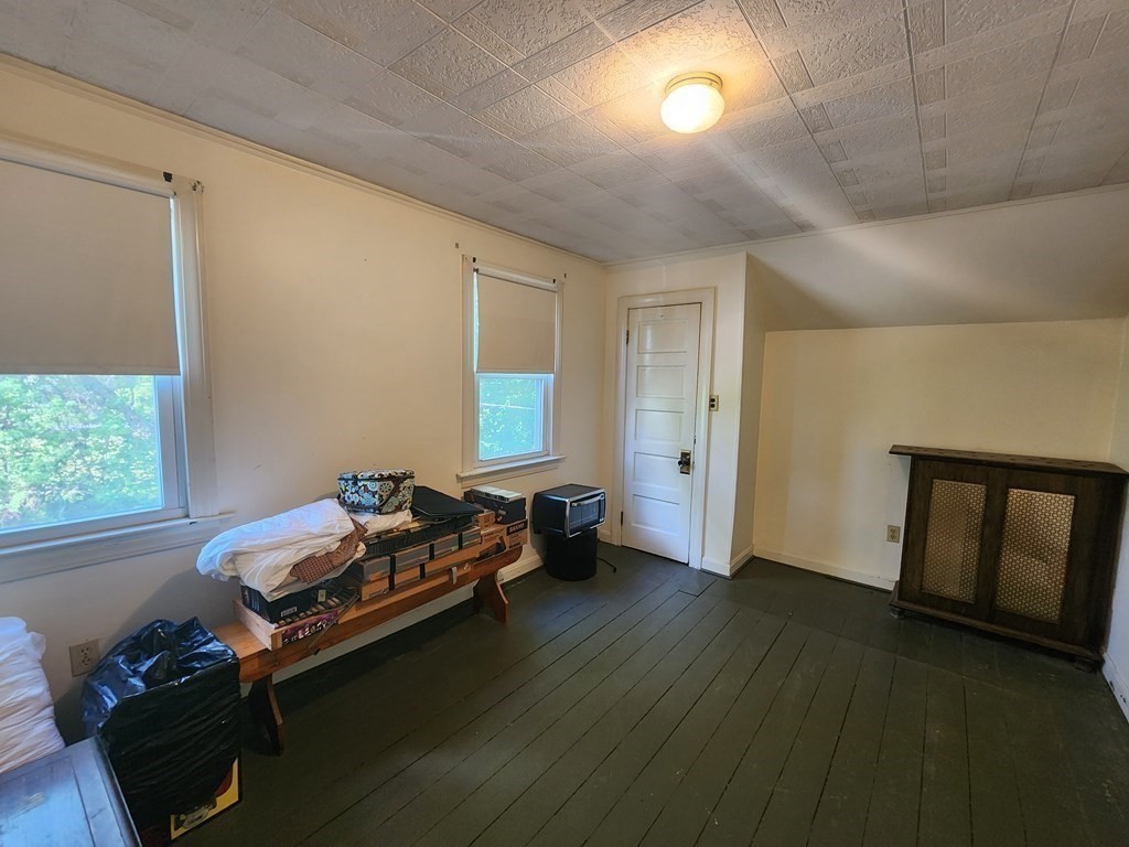 4 Sutton Place Worcester, MA 01603 - Photo 24 of 32 a living room with furniture and a window