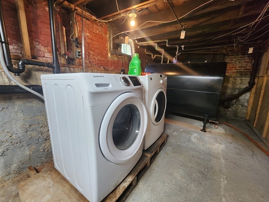 4 Sutton Place Worcester, MA 01603 - Photo 29 of 32 a utility room with dryer and washer