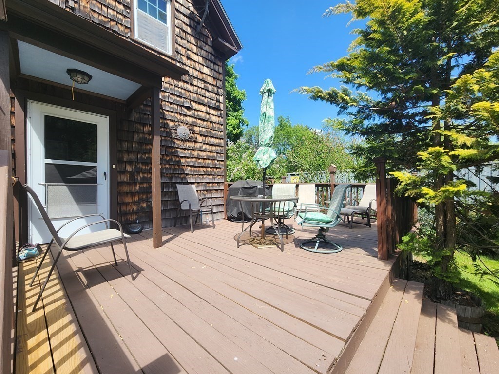 4 Sutton Place Worcester, MA 01603 - Photo 5 of 32 a view of a patio with chairs and potted plants