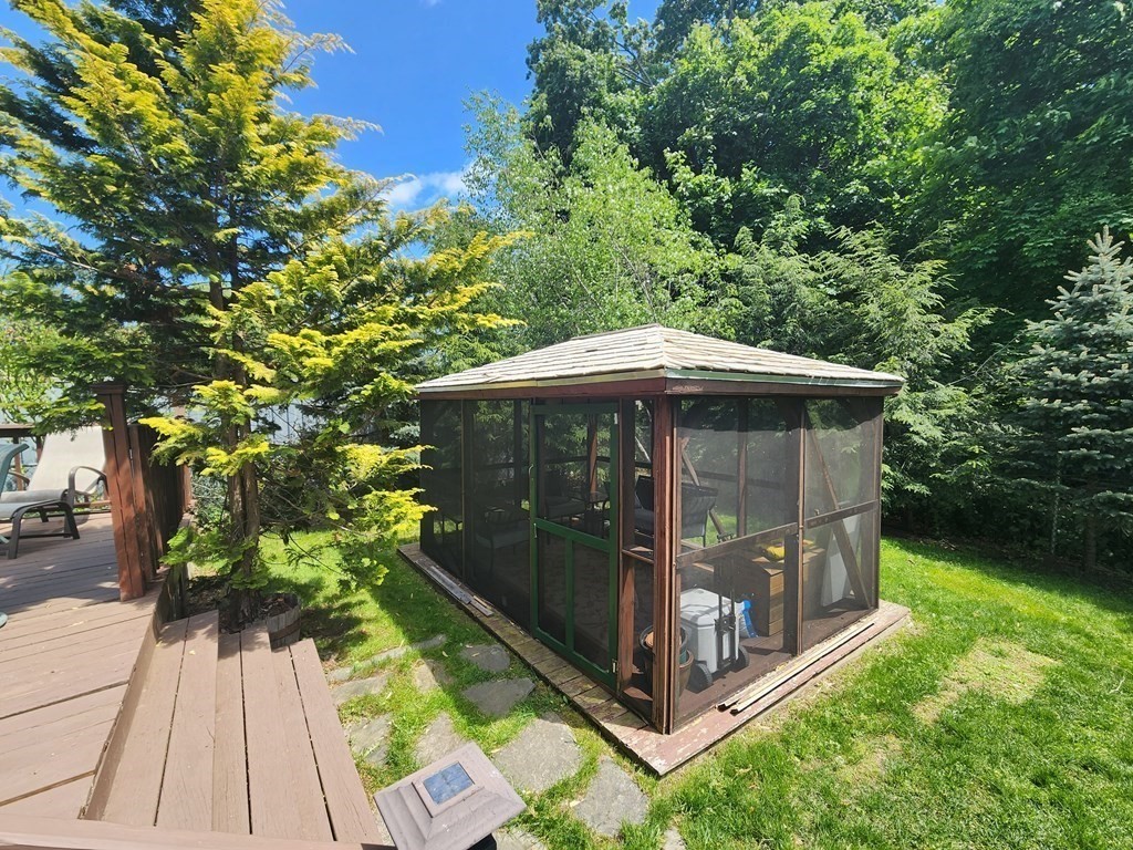 4 Sutton Place Worcester, MA 01603 - Photo 6 of 32 a view of a small house with a yard