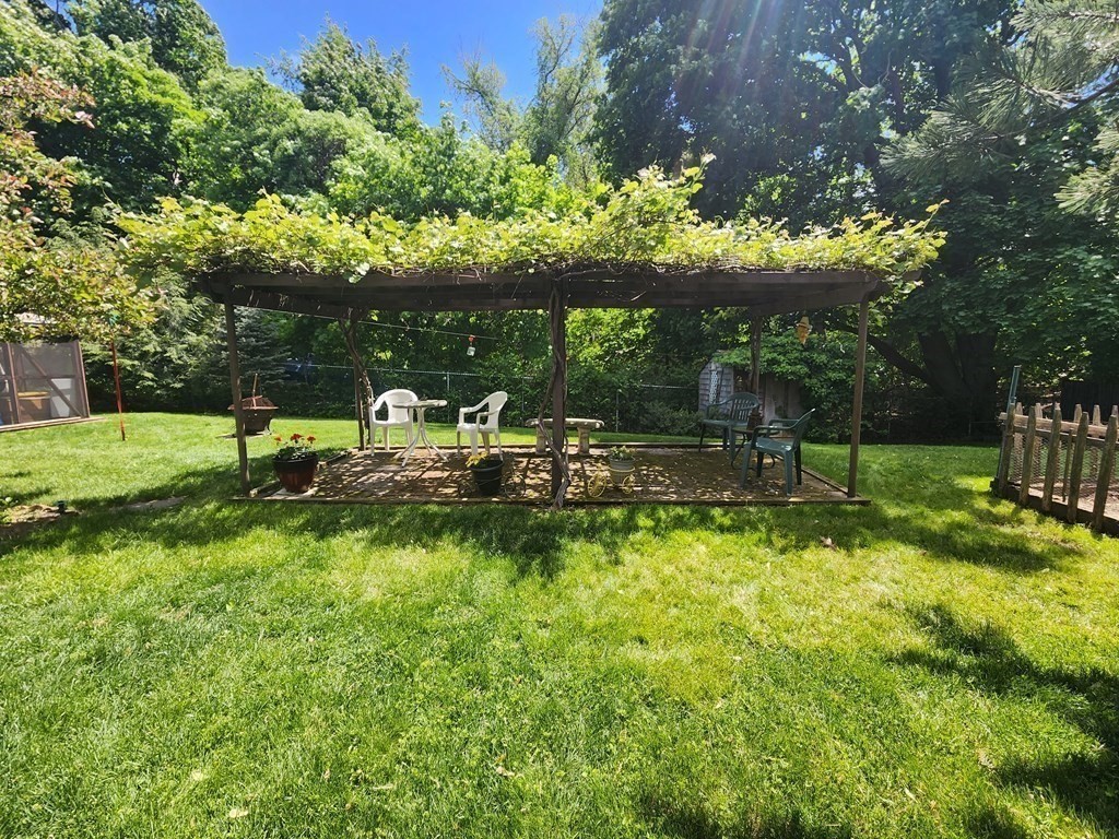 4 Sutton Place Worcester, MA 01603 - Photo 8 of 32 a view of a chair and table in the garden