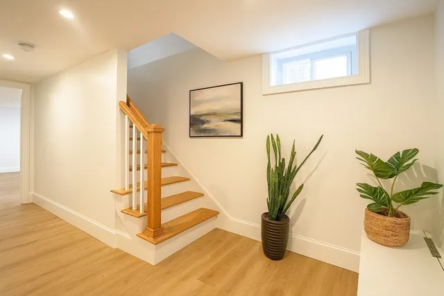a view of entryway with wooden floor