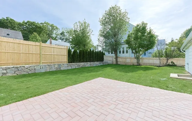 a view of a backyard with a garden