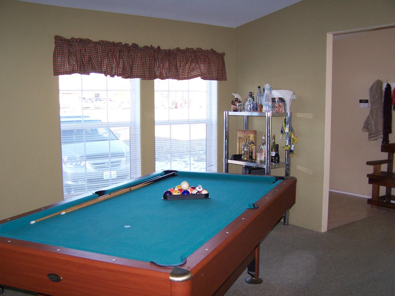 730 Durham Road Zillah, WA 98953 - Photo 6 of 11 a room with pool table and windows