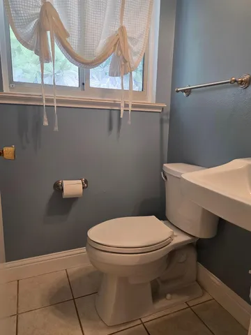 a view of backyard with green space