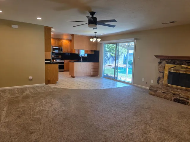 a living room with a fireplace