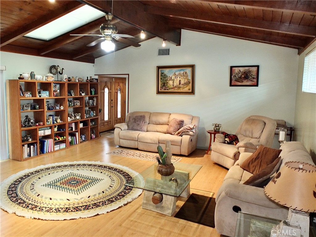 4907 139th Street Hawthorne, CA 90250 - Photo 12 of 47 a living room with lots of furniture and a chandelier