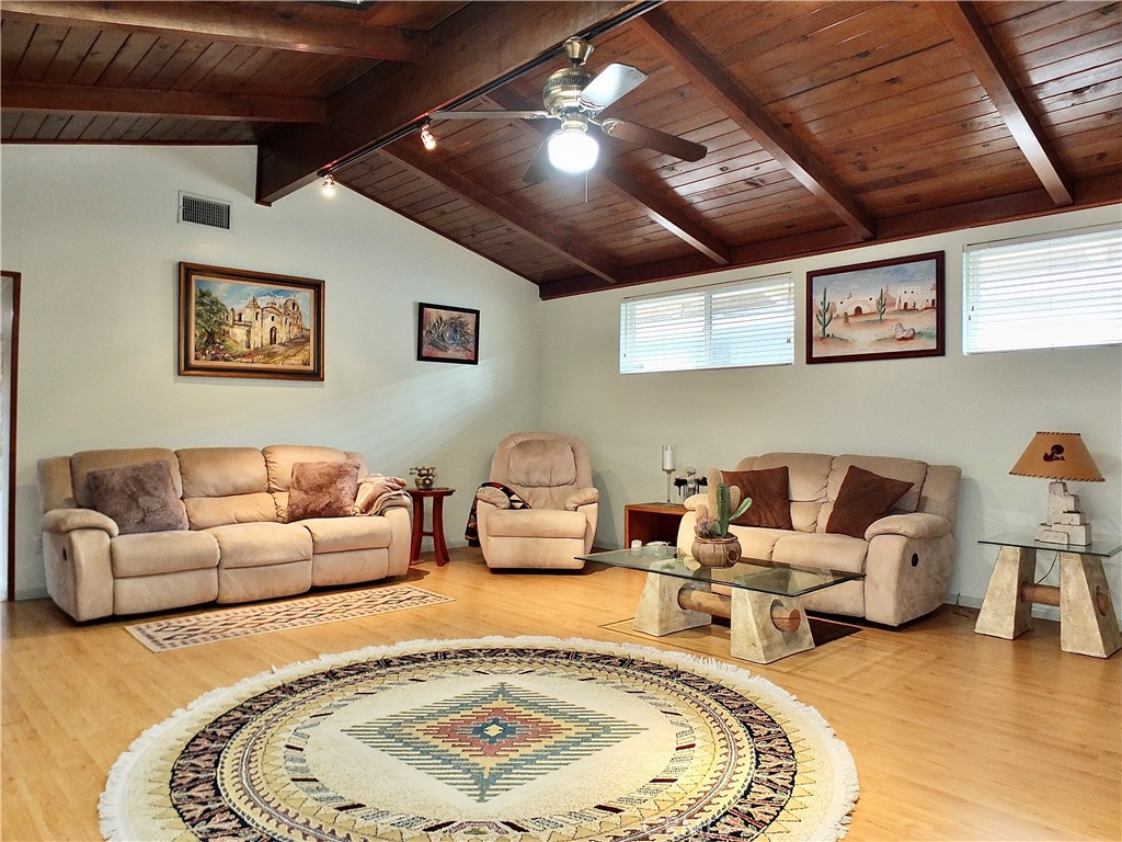 4907 139th Street Hawthorne, CA 90250 - Photo 13 of 47 a living room with furniture and a chandelier