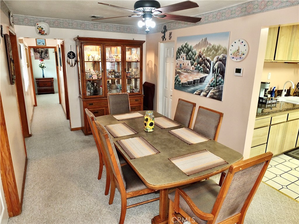 4907 139th Street Hawthorne, CA 90250 - Photo 18 of 47 a view of a dining room with furniture large window and wooden floor