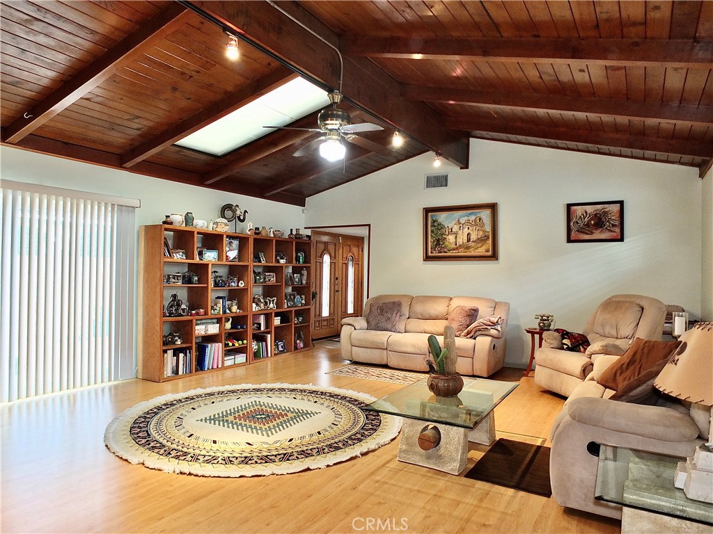 4907 139th Street Hawthorne, CA 90250 - Photo 2 of 47 a living room with lots of furniture and a chandelier