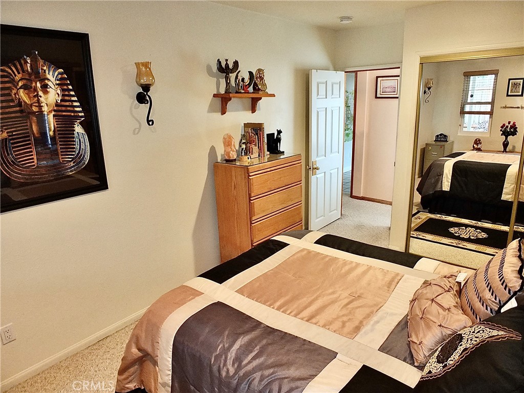 4907 139th Street Hawthorne, CA 90250 - Photo 33 of 47 a bedroom with a bed and a couch