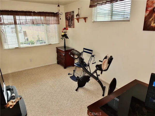 a bathroom with a double vanity sink toilet and shower
