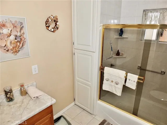 a view of a chairs and table in the patio with a yard