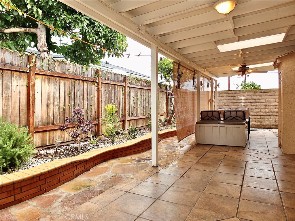 4907 139th Street Hawthorne, CA 90250 - Photo 42 of 47 a view of a chairs and table in the patio with a yard