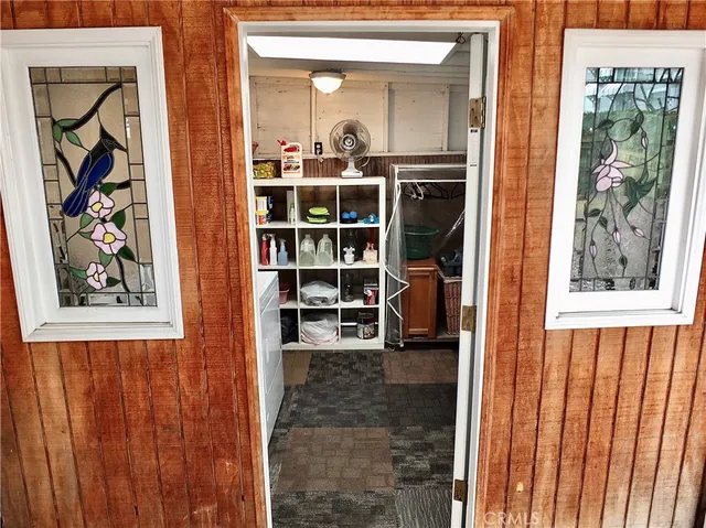 a view of a storage & utility room with washer and dryer