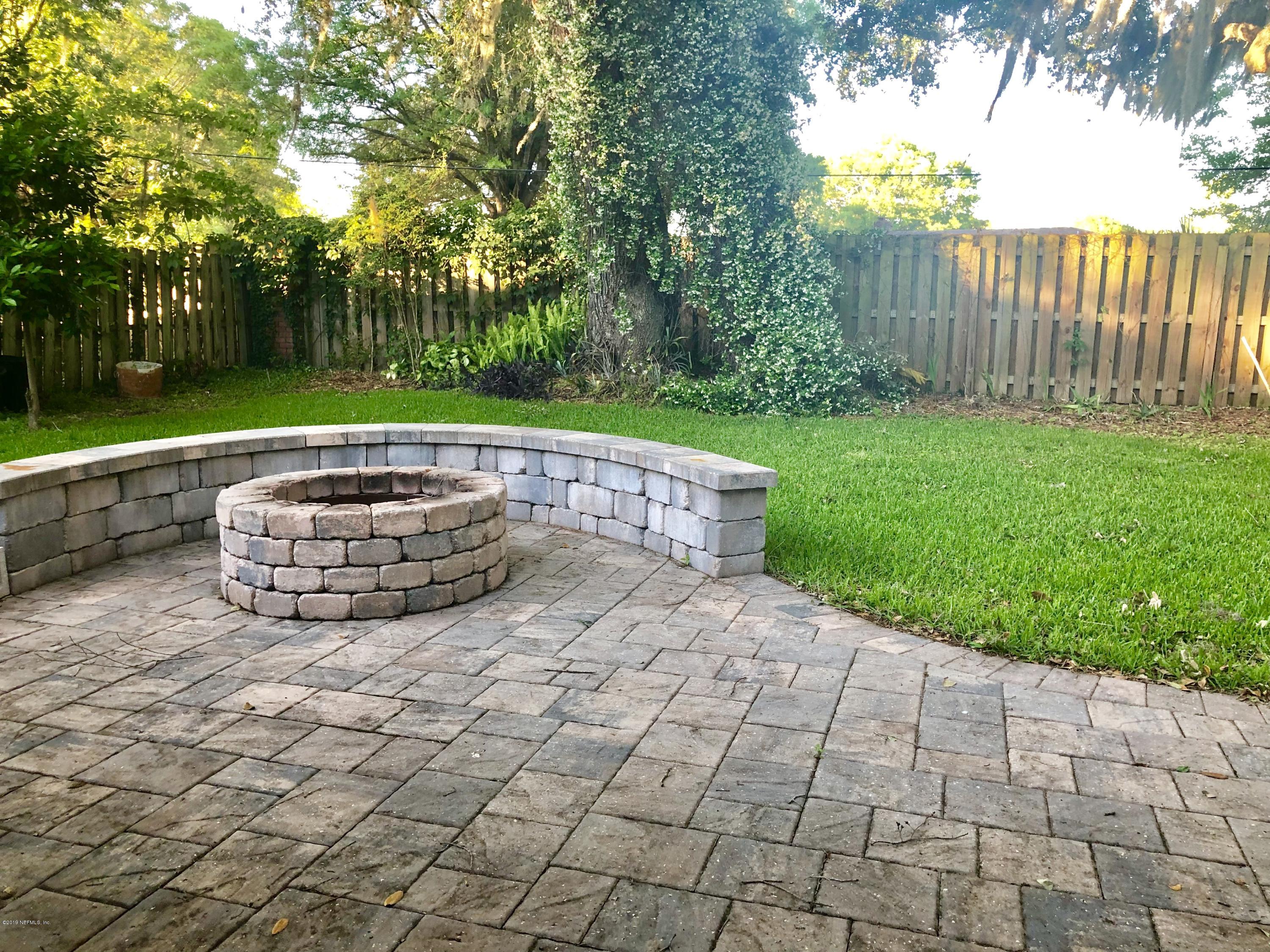 2457 Mallory Hills Road Jacksonville, FL 32221 - Photo 20 of 20 a view of backyard with trampoline