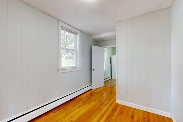 a view of empty room with front door