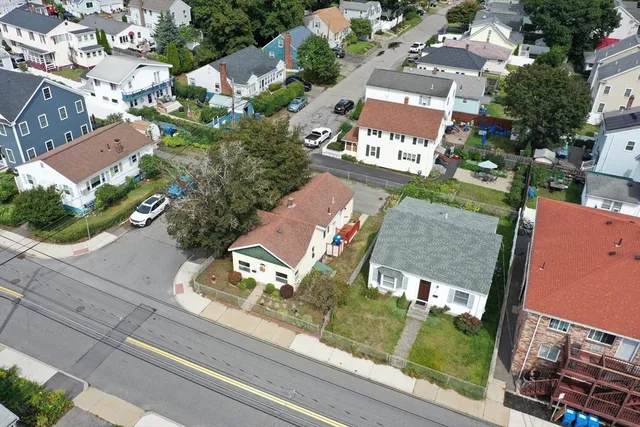 an aerial view of a city with lake view