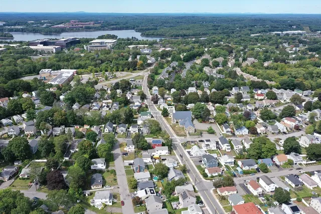 an aerial view of residential houses with outdoor space