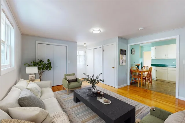 a living room with furniture and a table