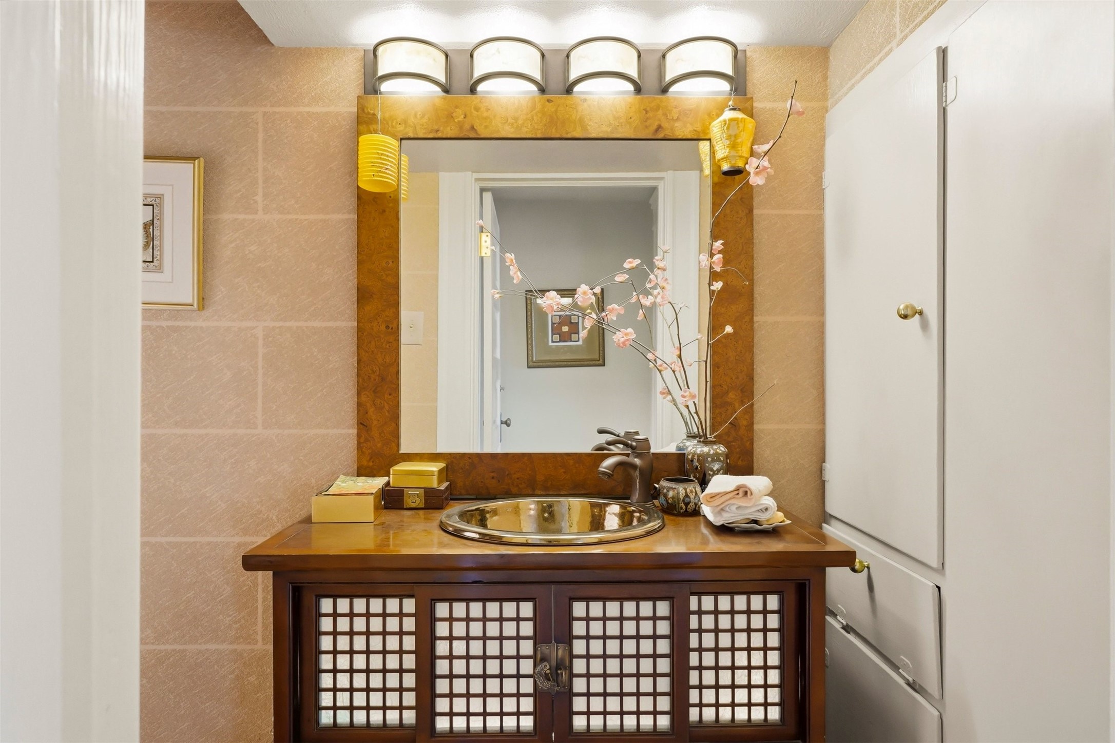 110 Stratford Street Houston, TX 77006 - Photo 16 of 40 a bathroom with a sink a mirror and a shower