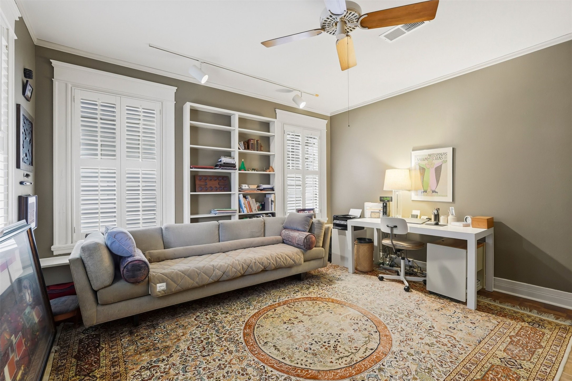110 Stratford Street Houston, TX 77006 - Photo 25 of 40 a living room with furniture a large window and a table