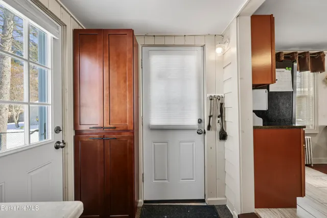a bathroom with a shower and a sink