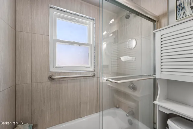 a bathroom with a sink and a shower
