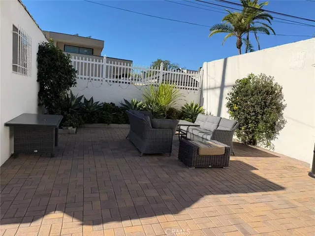 a potted plants sitting in front of a house