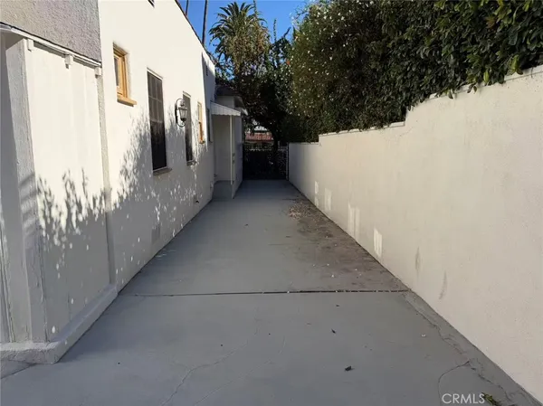 a view of an empty room with a fireplace