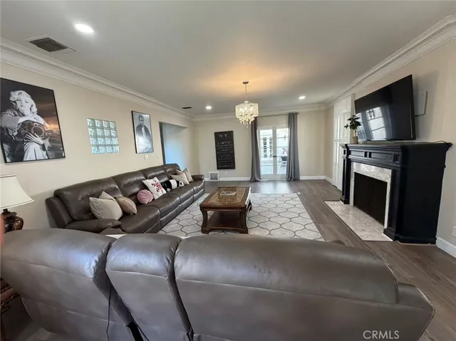 a living room with a couch and a flat screen tv