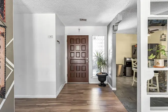 a view of livingroom with furniture and wooden floor