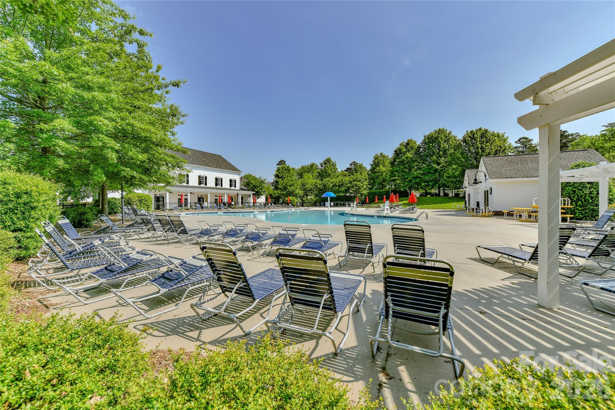 629 6th Baxter Crossing Fort Mill, SC 29708 - Photo 48 of 48 a view of backyard with swimming pool and seating space