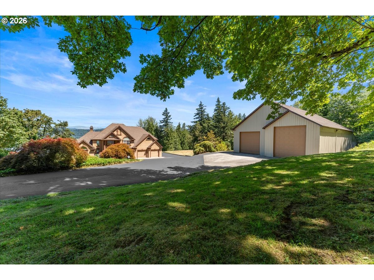 37123 Northeast Reed Road Corbett, OR 97019 - Photo 40 of 48 a house view with a garden space