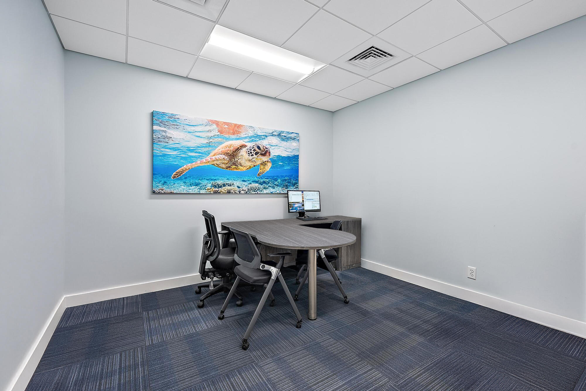 1125 Old Dixie Highway, Unit 4&5 Lake Park, FL 33403 - Photo 12 of 32 a view of a dining room with furniture and wooden floor