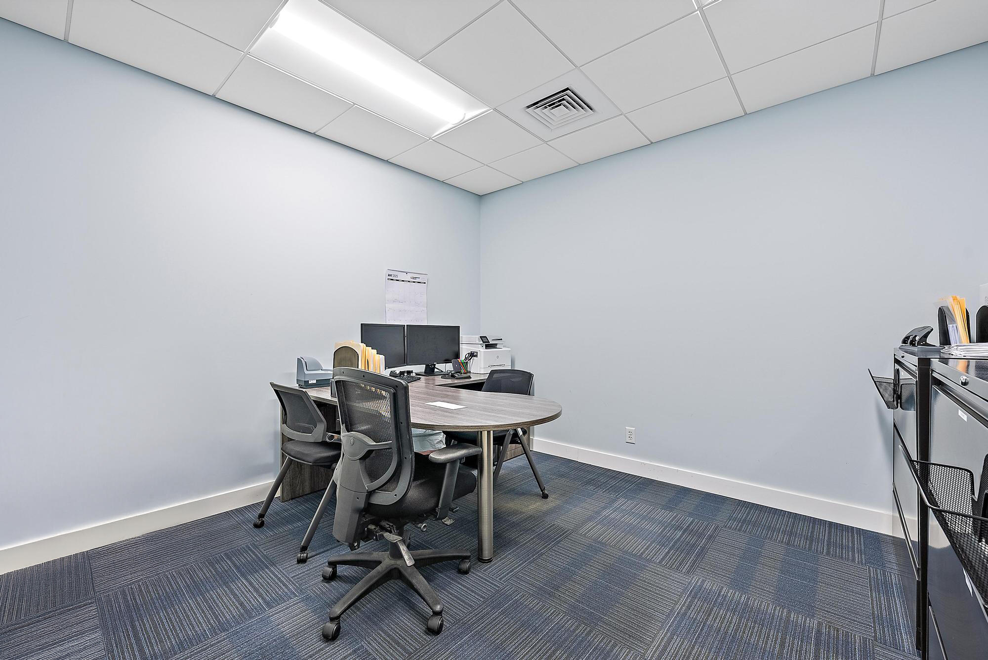 1125 Old Dixie Highway, Unit 4&5 Lake Park, FL 33403 - Photo 13 of 32 a view of a workspace with furniture and wooden floor