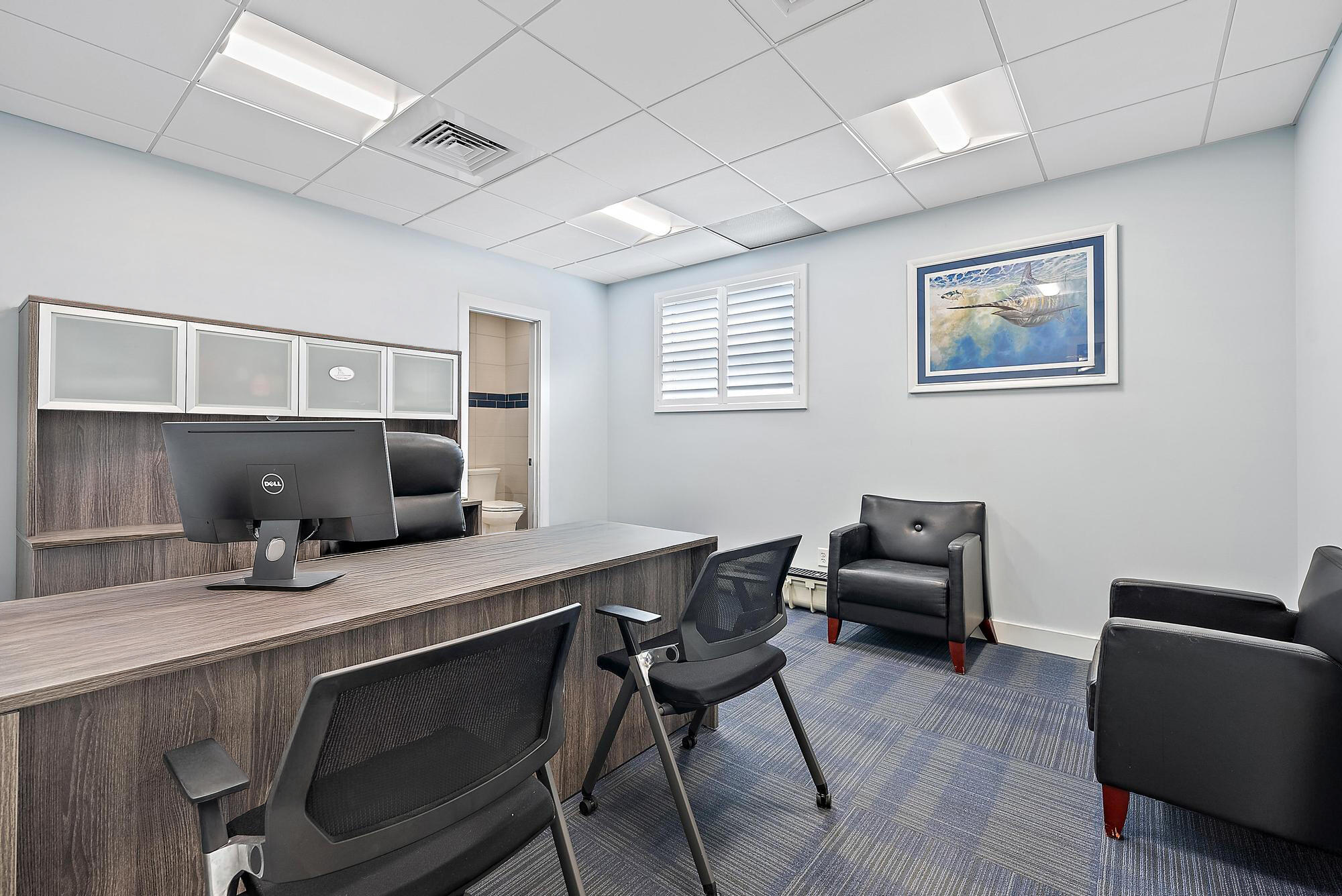 1125 Old Dixie Highway, Unit 4&5 Lake Park, FL 33403 - Photo 16 of 32 a workspace with furniture and window