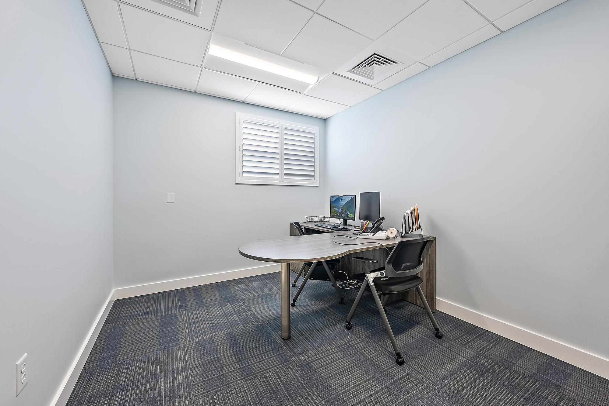 1125 Old Dixie Highway, Unit 4&5 Lake Park, FL 33403 - Photo 18 of 32 a view of a workspace with furniture