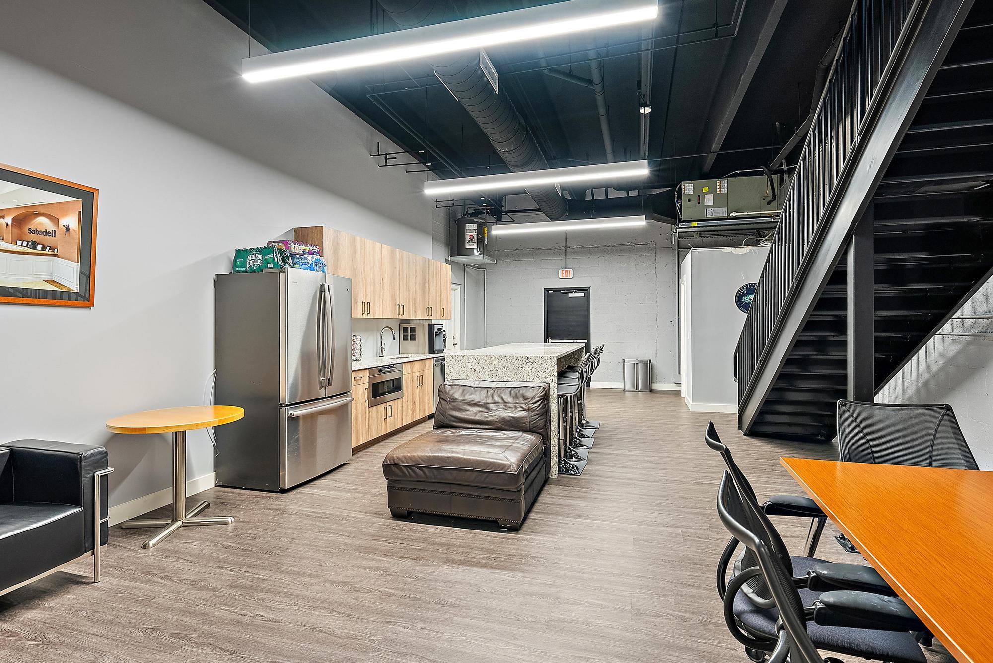 1125 Old Dixie Highway, Unit 4&5 Lake Park, FL 33403 - Photo 25 of 32 a view of kitchen with furniture and a refrigerator