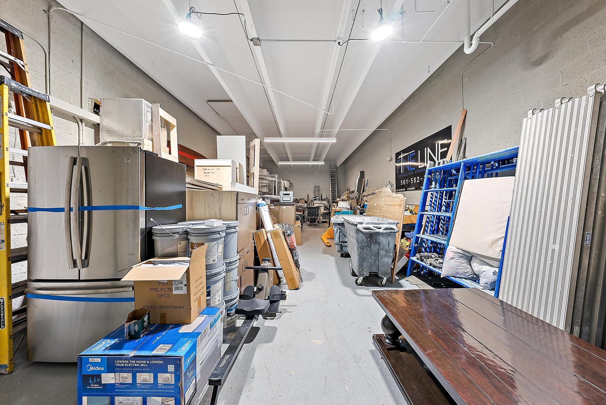1125 Old Dixie Highway, Unit 4&5 Lake Park, FL 33403 - Photo 27 of 32 a view of a room with gym equipment