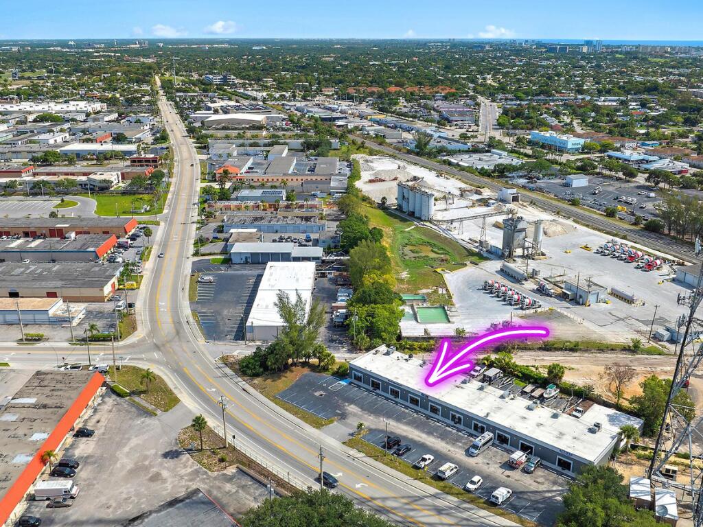 1125 Old Dixie Highway, Unit 4&5 Lake Park, FL 33403 - Photo 3 of 32 an aerial view of a city