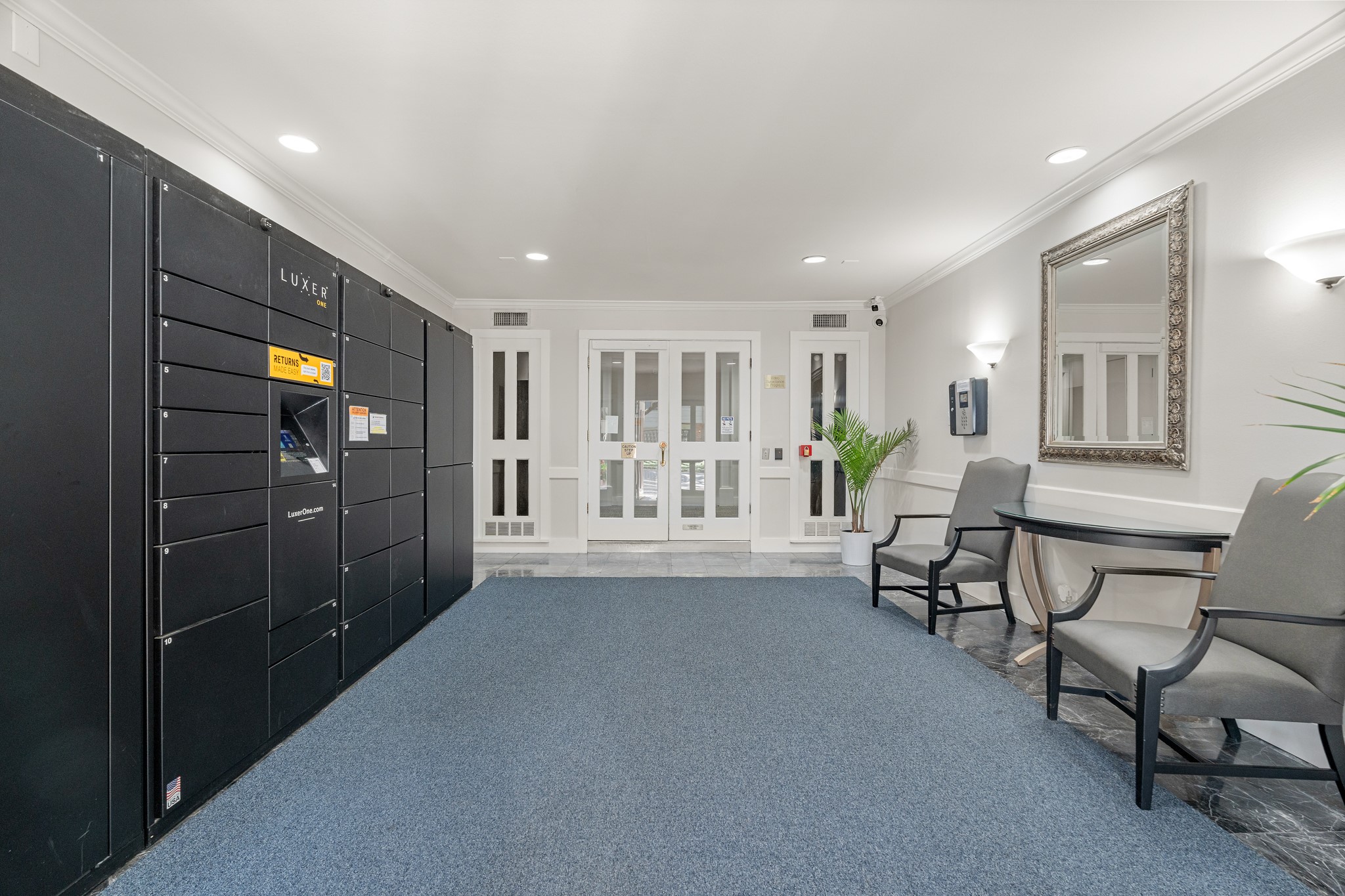 355 North Post Oak Lane, Unit 742 Houston, TX 77024 - Photo 3 of 18 a living room with furniture and a dining table with kitchen view