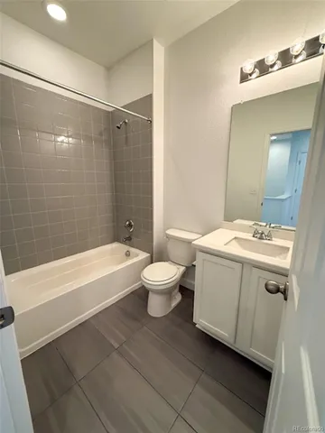 a bathroom with a sink a toilet and a bathtub