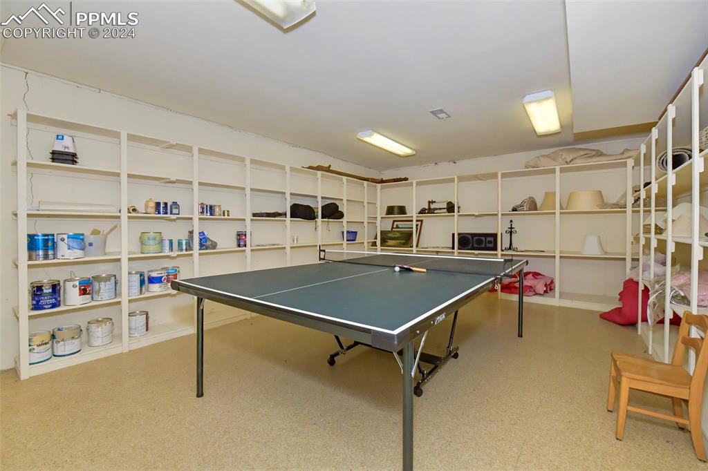 3130 Camels Ridge Lane Colorado Springs, CO 80904 - Photo 17 of 35 a room with furniture and a table