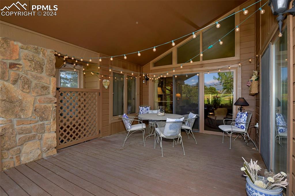 3130 Camels Ridge Lane Colorado Springs, CO 80904 - Photo 27 of 35 a view of a patio with table and chairs