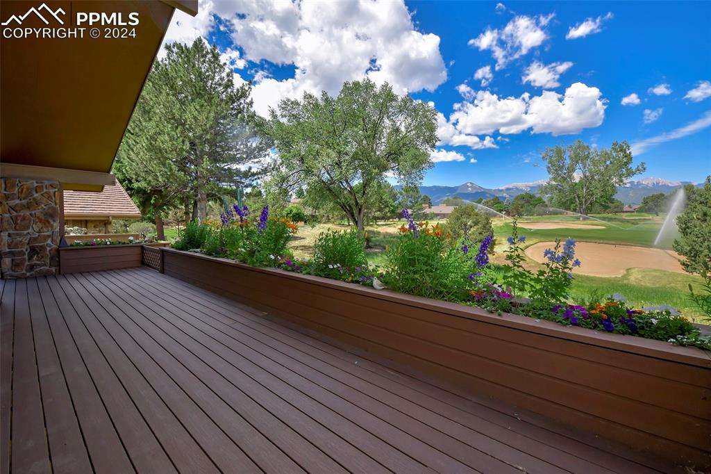 3130 Camels Ridge Lane Colorado Springs, CO 80904 - Photo 28 of 35 a view of a balcony with wooden floor