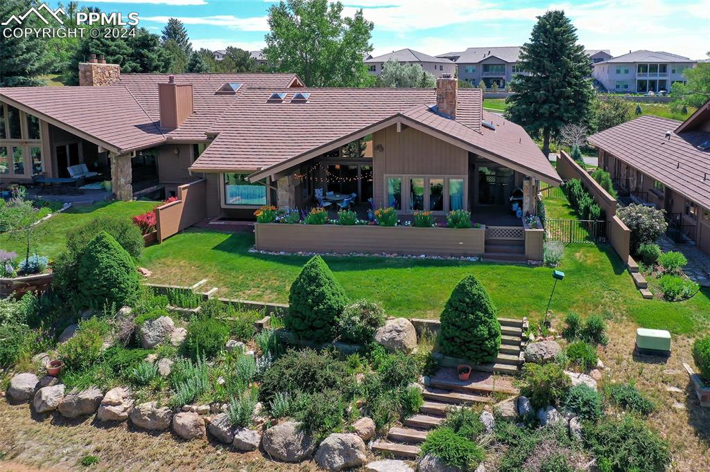 3130 Camels Ridge Lane Colorado Springs, CO 80904 - Photo 30 of 35 front view of a house with a yard